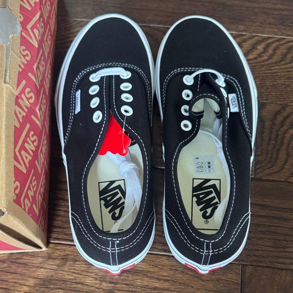 Vans Kids Black Slip-On Canvas Sneakers with White Accents